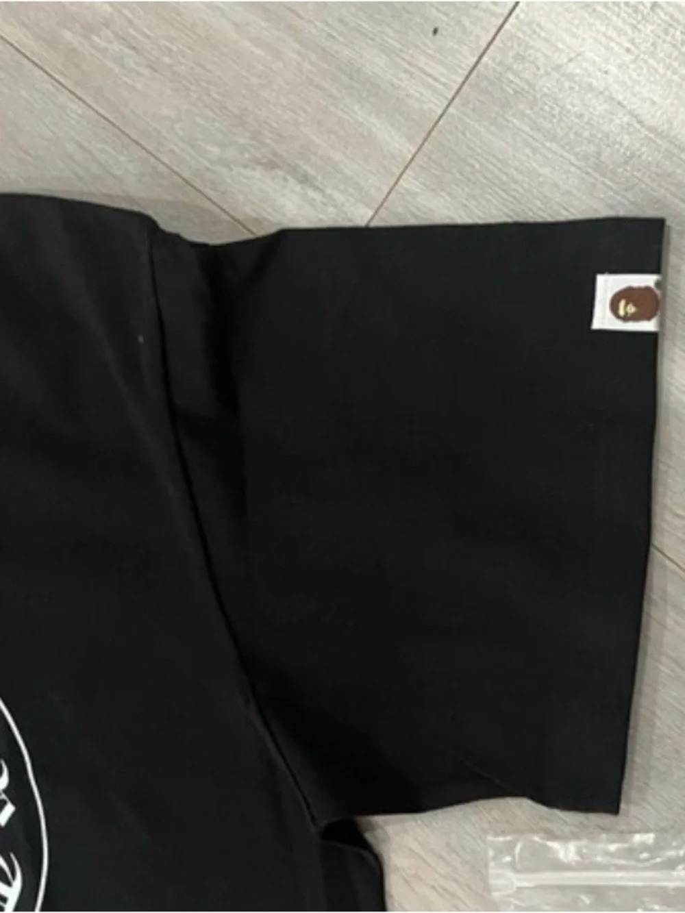 Bape Black Tee with White Ape Crest Graphic
